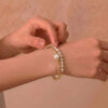 1000x1000_MDW-10 Pearl Bangle in 18K Yellow Gold